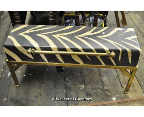 *A modern zebra print box window seat with brass handle and supports, 102cm wide.