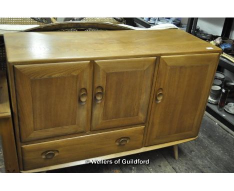 An Ercol sideboard, 114cm wide.