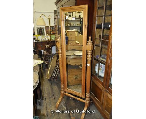 A modern pine cheval mirror.