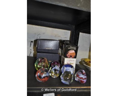 Caithness paperweights: Atlantis, Reflections, Fiesta, Trapeze, Pixie, and four Caithness pebbles, mostly boxes.