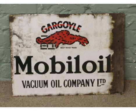 A vintage double sided enamel sign for Gargoyle mobil oil.