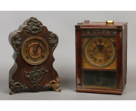 A simulated Kingwood painted metal cased bracket clock housing an Ansonia movement, along with an assembled case housing a Vi