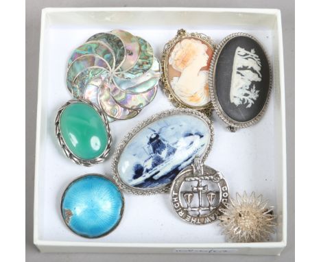 Eight silver brooches including Wedgwood Jasperware example and one with enamel decoration.