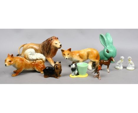 A group of decorative ceramic models of animals including Staffordshire style dogs, a copper craft Yorkshire Terrier, Goebel 