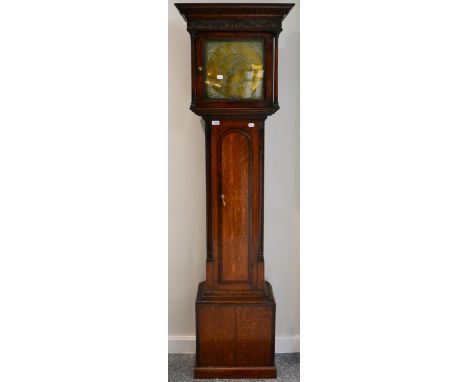 An oak thirty hour longcase clock, signed Roberts, Otley, 1777, flat top pediment, arched trunk door with mahogany crossbandi