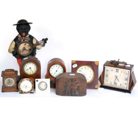 ^ An Edwardian mahogany mantel timepiece inlaid with apatara, 17.5 cm; an Art Deco mantel timepiece 16cm high; a Japanned man