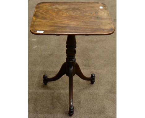 ^ A Regency mahogany flip-top tripod table raised on turned varsey formed support with three splayed legs, 50cm wide 