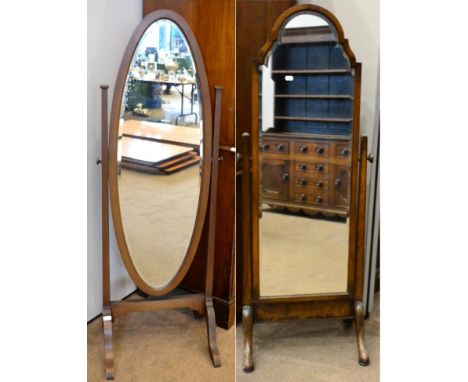 ^ A 1920's walnut framed bevel glass cheval mirror, 168cm high; together with an Edwardian mahogany oval cheval mirror, 155cm