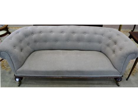 A Victorian Chesterfield sofa, recovered in grey button back corduroy with rounded arms and overstuffed seat, 173cm wide 