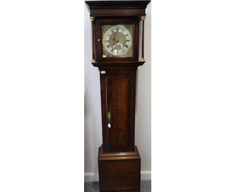 An oak thirty hour longcase clock, signed Jonas Barber, Winster, numbered 677, circa 1764, flat top pediment, mahogany crossb