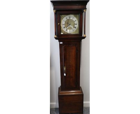 An oak thirty hour longcase clock, signed Jonas Barber, Winster, numbered 677, circa 1764, flat top pediment, mahogany crossb