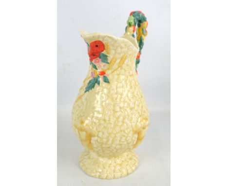 CLARICE CLIFF; a Newport Pottery 'Celtic Harvest' pattern jug, height 28.5cm.