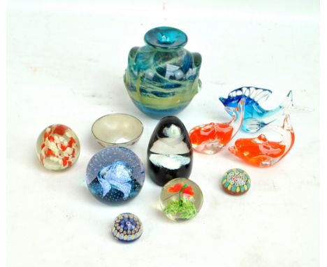 A mixed lot of glass paperweights including Caithness examples, also a Mdina vase and a small dish. 