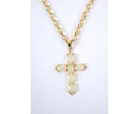 A 9ct yellow gold chain supporting a 14ct opal set cross pendant, combined approx 7.1g.