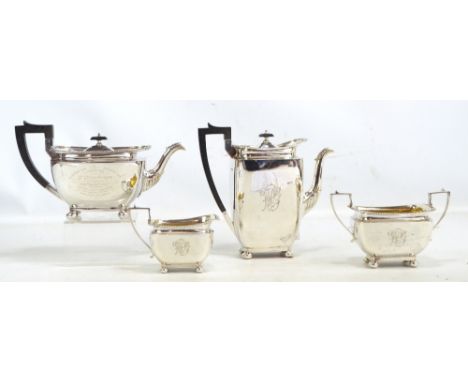 JAMES DIXON & SONS; a George V hallmarked silver four piece tea set comprising a rounded rectangular teapot with cast decorat