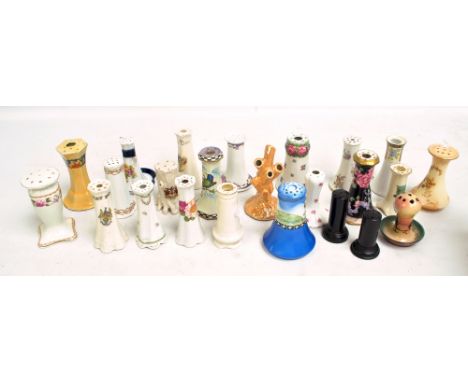 A collection of various ceramic hat pin stands including WR & S 'Porcelle', Swan China and Noritake examples, also two ebonis