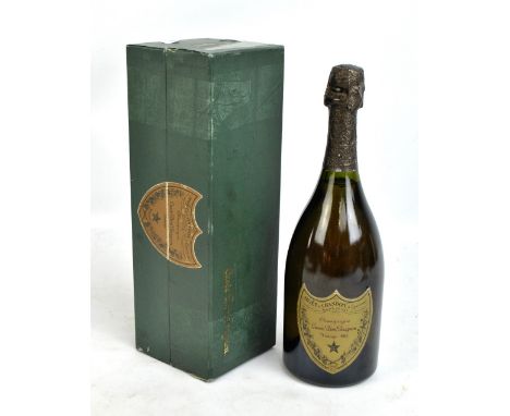 A bottle of Moët Et Chandon Cuvée Dom Pérignon 1982 vintage champagne, 75cl, boxed. CONDITION REPORT: Label with slight wear 