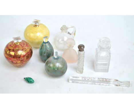 A group of scent bottles including two Atkinson-Jones lustre ware porcelain bottles with stoppers, both initialled to bases, 