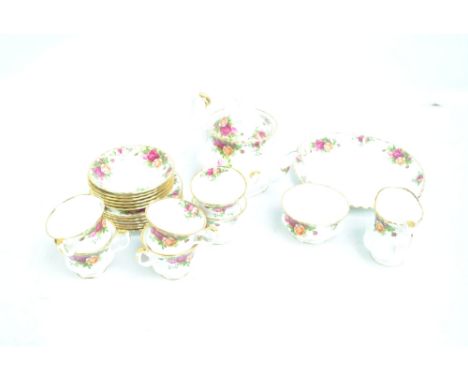 A Royal Albert 'Old Country Roses' pattern decorated six setting tea set comprising a teapot, trios, a sugar bowl, a cream ju