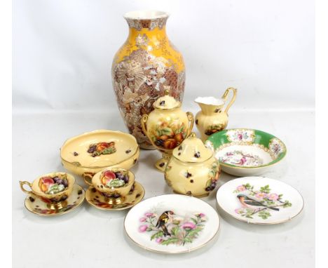 A small group of Aynsley 'Orchard Gold' pattern decorated items including an urn, a pair of cups and saucers and a jug, also 