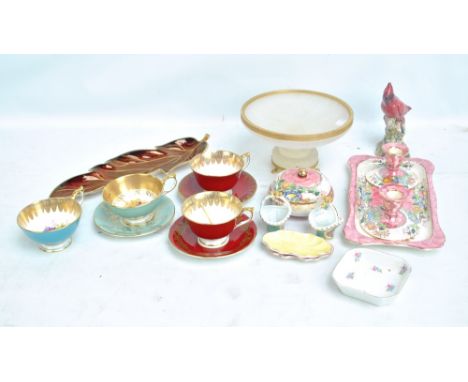 A small group of ceramics including a Maling 'Peony Rose' part dressing table set, a pair of Limoges miniature baskets, a Car