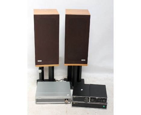 A 'Naim Audio' pre-amp, splitter, a Trio FM/AM receiver and a pair of Pro AC speakers on stands. CONDITION REPORT: Light wear
