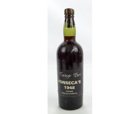 A bottle of Fonseca 1948 vintage port. CONDITION REPORT: Level low neck, approx 1cm above joint of neck and shoulder, label s