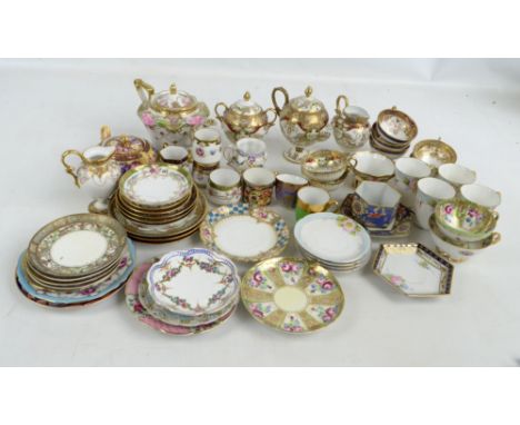 A large collection of Noritake tea and coffee ware including floral decorated cups and saucers, pedestal teapots, pedestal ju