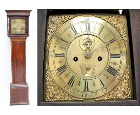 R SCHOFIELD OF ROCHDALE; an oak and mahogany crossbanded longcase clock, the moulded cornice above brass dial with circular c