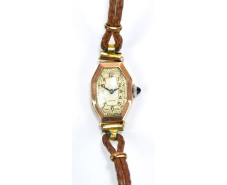 A lady's vintage 9ct yellow gold cased wristwatch with elongated octagonal case and dial, 'sapphire' winding cabochon and pre