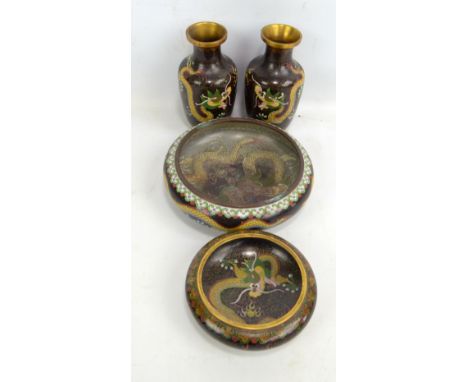 A pair of 20th century Chinese cloisonné dragon decorated vases, height 16.5cm, and two bowls (4). CONDITION REPORT: The inte
