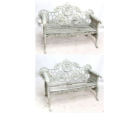A pair of green painted cast iron garden benches on paw feet, width of each approx 150cm (2). CONDITION REPORT: Considerable 