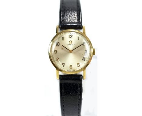 OMEGA; a lady's vintage 9ct yellow gold wristwatch with circular dial set with Arabic numerals, diameter excluding winding cr