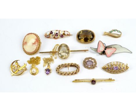 A group of predominantly 9ct yellow gold brooches including a cameo example, a pierced oval example, etc, also a silver and e