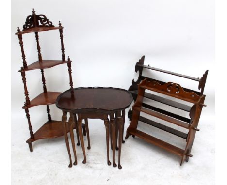 A kidney shaped nest of three tables, 59 x 40cm, a serpentine fronted four tier whatnot and two wall shelf units (4).