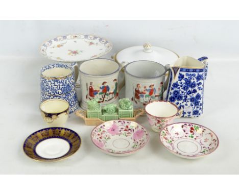 A group of decorative ceramics including two frog mugs, a Sylvac cruet, triangular jug, etc.