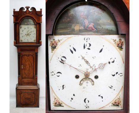 An early 19th century oak and mahogany crossbanded eight day longcase clock with arched painted dial, short door, fluted upri