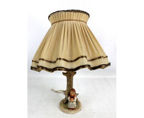 A 1960s Hummel lamp base 'Girl With Lamb', height 24cm.