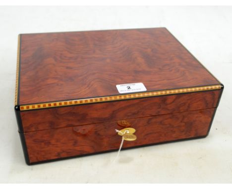 A modern Dunhill humidor with key, 28.5 x 22 x 10.5cm. CONDITION REPORT: There is no guarantee that this item is working, the
