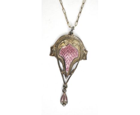 An Arts and Crafts George V hallmarked silver and pink guilloche enamel decorated pendant suspended on a simple silver neckla
