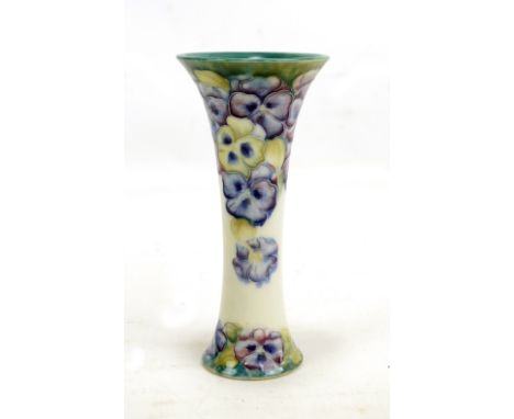 An early Moorcroft McIntyre 'Pansy' pattern trumpet vase signed W Moorcroft and with the McIntyre Burslem stamp to the base, 