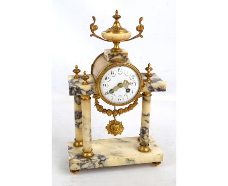 A late 19th century French marble portico mantel clock with gilt metal mounts and urn shaped finial, the white enamel dial se