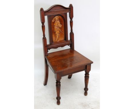 A mahogany hall chair with inset ceramic tile to back.