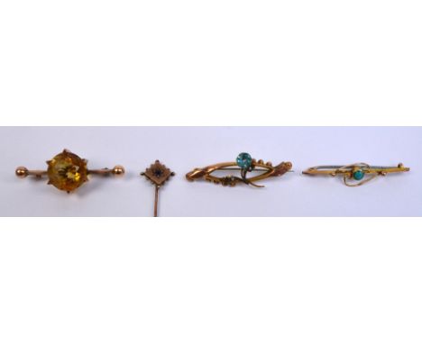 Three 9ct yellow gold Edwardian bar brooches, one set with a large circular citrine, and a stick pin (4).