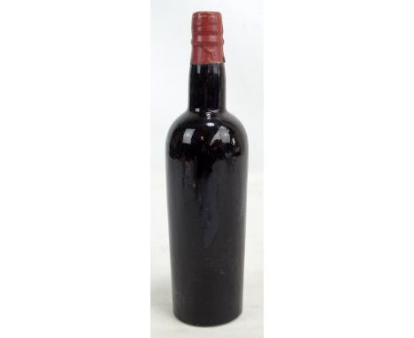 A bottle of Taylor's 1948 vintage port. CONDITION REPORT: Outer wrapper with lower section lost, the bottle has no labels, th