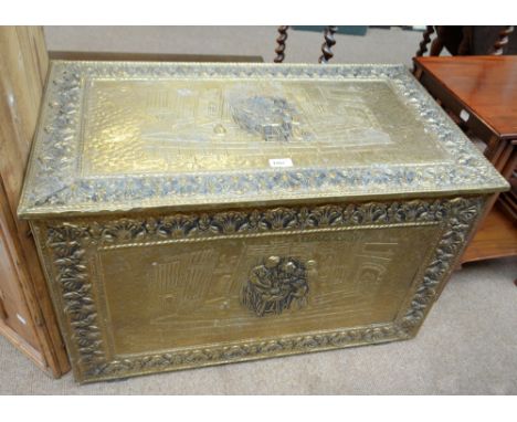 An embossed brass clad trunk, width 79cm.