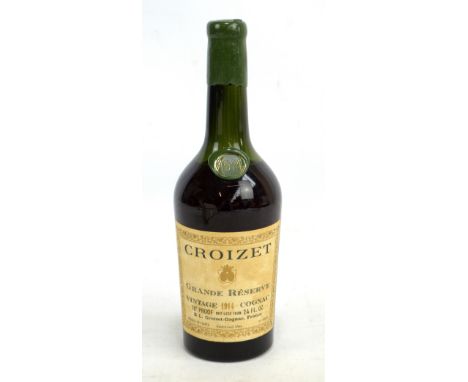 A bottle of Croizet Grande Réserve Vintage 1914 cognac, 24fl.oz, sealed, liquid level below the neck.
