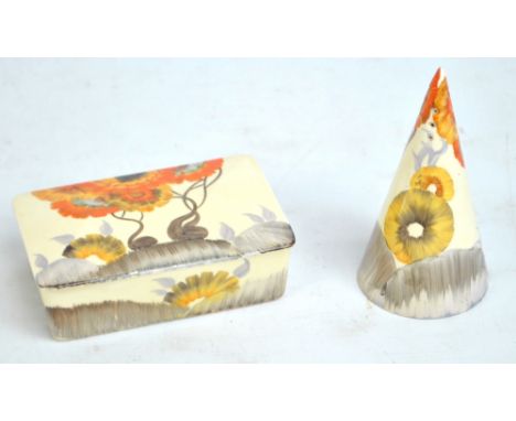 CLARICE CLIFF; a 'Rhodanthe' pattern rectangular butter dish and cover and a conical sugar sifter, height of sifter 14.25cm (