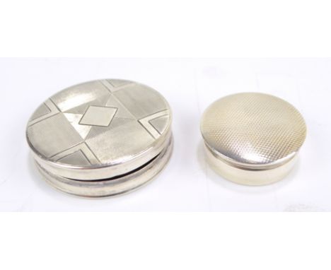 ADIE BROS LTD; a George VI hallmarked silver Art Deco style circular pill box with engine turned decorated detachable lid, Bi