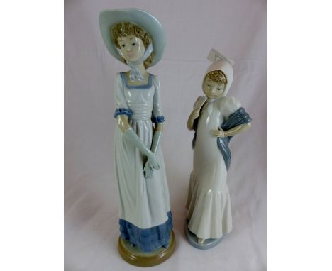 Two nao figurines depicting young girls